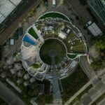 an aerial view of a circular building in a city